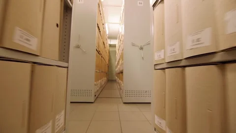 Metal cabinets filled with boxes of documents Stock Footage 251320649