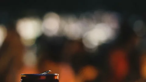 Metal can with a drink on a disco background. Stock Footage 116156586