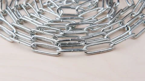 The metal chain rotates at the top. Stock Footage 201674570