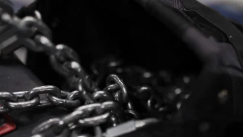 Metal chains inside open stage equipment bag Stock Footage 308624968