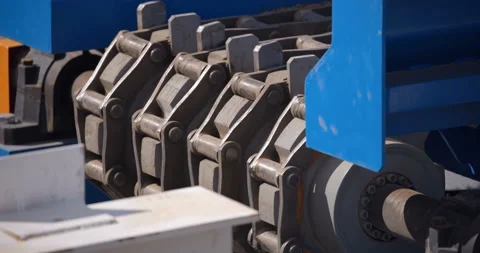 Metal chains move on a conveyor belt in a wood processing plant Stock Footage 161966712