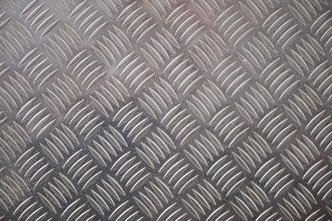 Metal Checker Plate Pattern for Backgrounds Stockfoto's