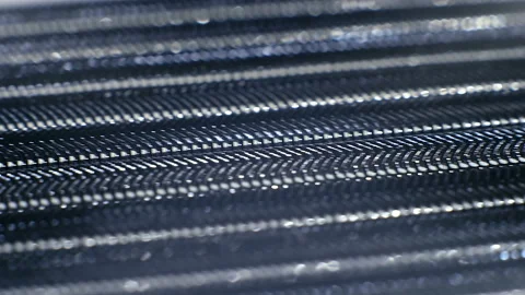 Metal chromed chains create an interesting repeating geometric pattern Stock Footage 130410648