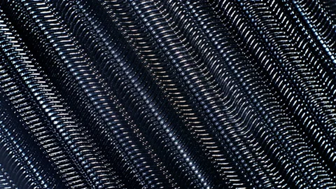 Metal chromed chains create an interesting repeating geometric pattern Stock Footage 130494762
