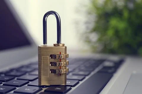 Metal code padlock on laptop keyboard, space for text. Cyber security concept 스톡 사진