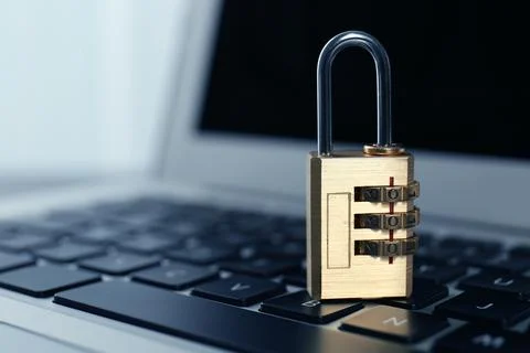 Metal code padlock on laptop keyboard, space for text. Cyber security concept Stockfoto's