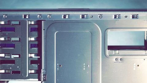 Metal computer case close-up. Computer Accessories Conception. Digital Wall.. Stock Photos