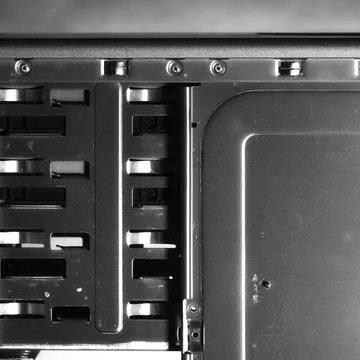 Metal computer case inside close-up. Computer Accessories Conception. Digital Stock Photos