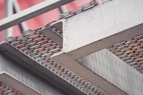 Metal construction. Iron elements. The structure is covered with gray paint Stock Photos