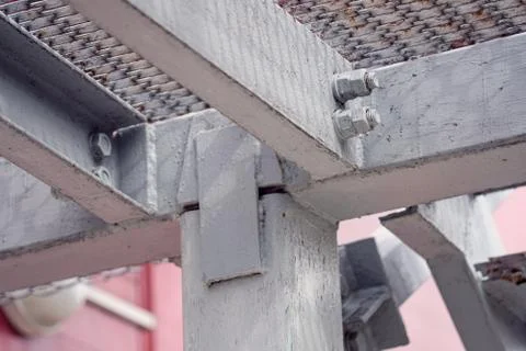 Metal construction. Iron elements. The structure is covered with gray paint Stock Photos