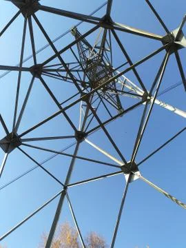 Metal construction on sky background Stock Photos