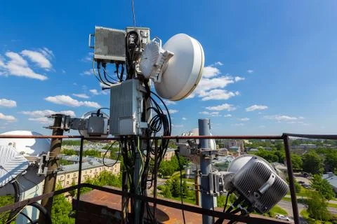 Metal construction for telecommunication data equipment or mast with microwave Stock Photos