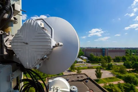 Metal construction for telecommunication data equipment or mast with microwave Stock Photos