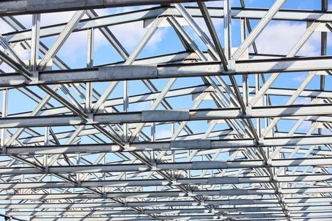 Metal construction texture pattern. Urban geometrical interlacing of bolted c Foto stock