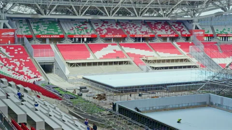 Metal constructions and red seats on tribune on city arena Stock Footage 231223048