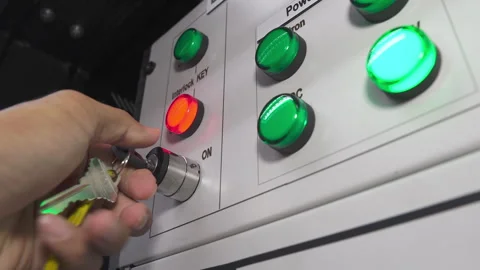 Metal control panel with many lights red button for turning on and emergency off Stock Footage 249614486