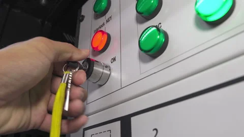 Metal control panel with many lights red button for turning on and emergency off Stock Footage 249614581