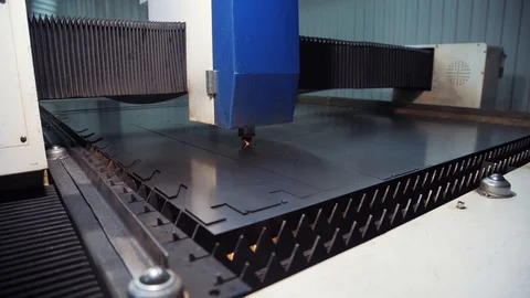 Metal is cut at the plant with the help of a laser Stock Footage 108648564