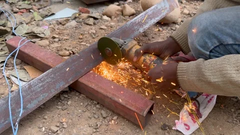 Metal Cutting with Angle Grinder Creating Sparks Video stock 326483204