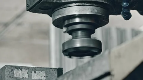 Metal cutting process in factory setting with industrial milling machine Stock Footage 281420477