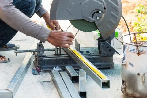 Metal cutting process in workshop construction site action outdoor close-up.. Stock Photos
