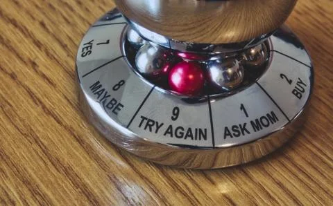 Metal decision maker with 'Try again' selected from the wheel of options Stock Photos