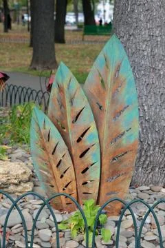 Metal decorative elements for decorating flower beds in parks. Fotos Stock