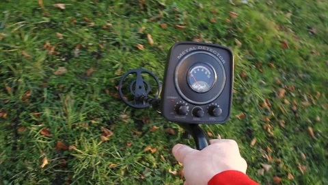 Metal detector in hand Stock Footage 101883140