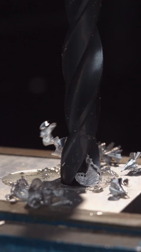 Metal Drill: 4K Vertical Slow-Mo Stock Footage 265599347