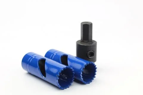 Metal drill crown with adapter, isolate on white. Stock Photos