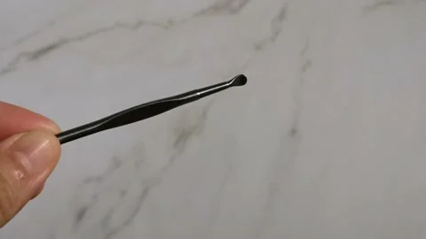 Metal Ear Cleaner Spoon Stock Footage 205828053