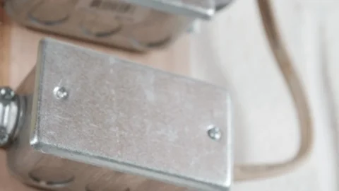 Metal Electrical Box Mounted to Wall CLOSE UP SLIDE RIGHT Stock-Footage 104872895