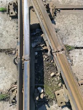 Metal elements of the tram rail system Stock Photos