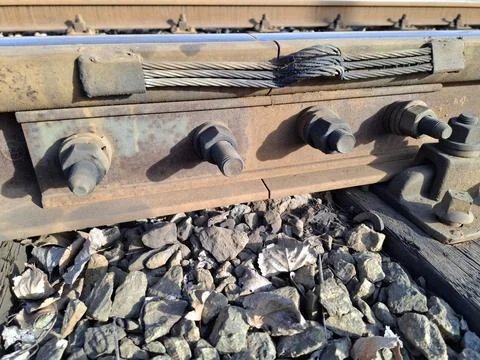 Metal elements of the tramway rail system. Bolted fastening connections Stock Photos