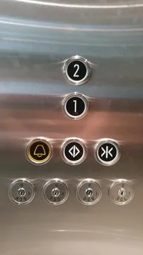 Metal elevator control button panel Stock Photos