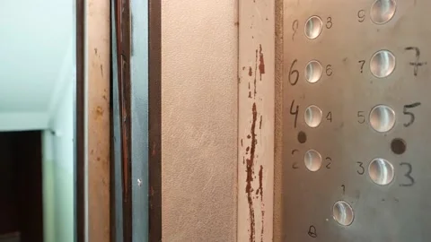 The metal elevator doors open automatically. Badly worn interior of an elevator Video stock 138598445
