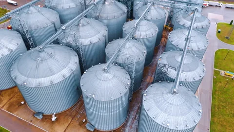 Metal elevator tanks storing grain.  Stock Footage 298669915