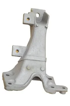 Metal engine component displayed against a textured gray background highlig.. Foto stock