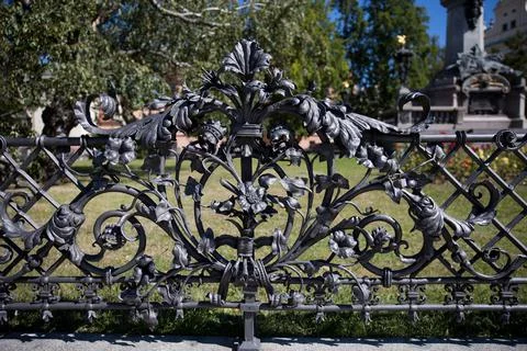 Metal fence with a beautiful floral pattern Stock Photos