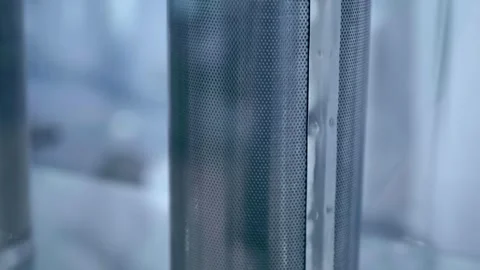 Metal filter meshes with different structures for mechanical retention of debris Stock Footage 340632753