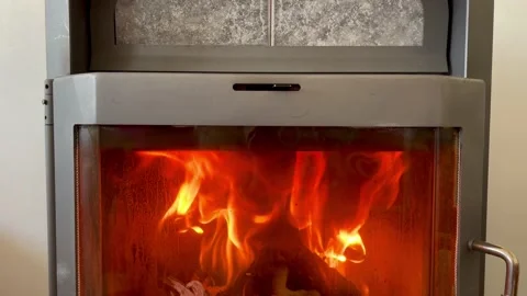 Metal fireplace with burning fire Stock Footage 172164054