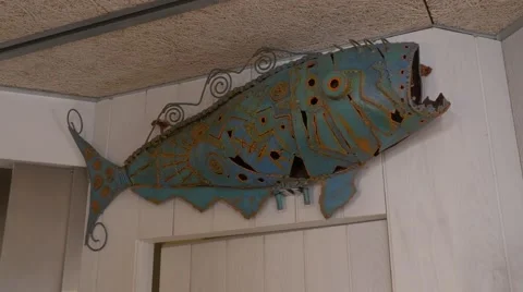 Metal fish on the wall Stock Footage 68341070