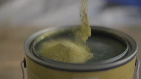 Metal flakes added to paint side view slow motion Stock Footage 260249752