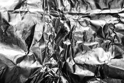 Metal foil texture surface backdrop photo. Stock Photos
