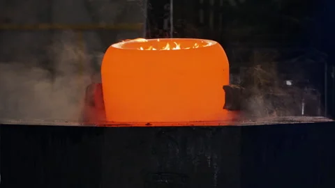 Metal forging for aerospace parts using industrial forging press with red hot Stock Footage 239160551