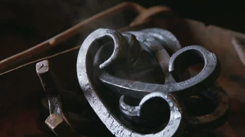 Metal forging, Forging hot metal in smithy, Sparks, hard work Stock Footage 68634530