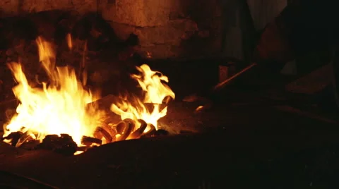 Metal forging, Forging hot metal in smithy, Sparks, hard work Stock Footage 68635874