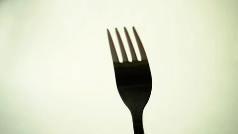 Metal fork on white background. 4 Stock Footage 97876135