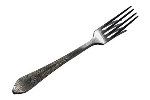 Metal fork on a white background Stock Photos