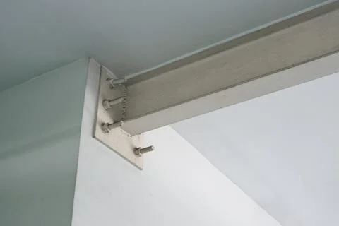 Metal frame attached to concrete structure Stock Photos